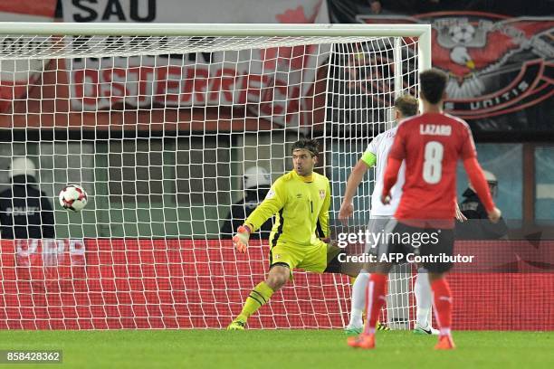 Austria's Marko Arnautovic scores the third goal despite of Serbia's goalkeeper Vladimir Stojkovic during the FIFA World Cup 2018 qualification...