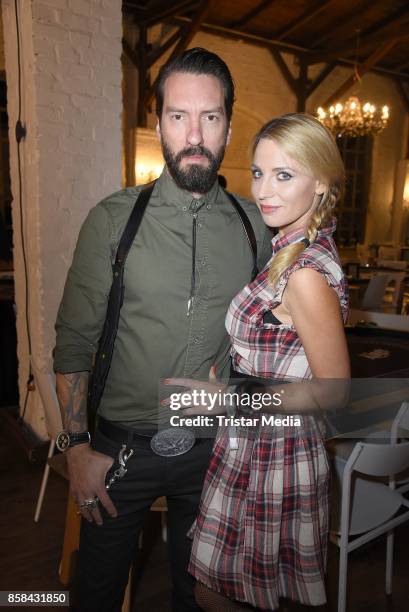 Alec Voelkel of the band The BossHoss and his wife Johanna Michels attend the 'CMS Gamblers Night - Western Style' of Christoph Metzelder Foundation...