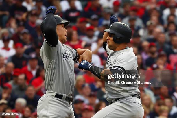 Gary Sanchez celebrates his two-run home run Aaron Judge of the New York Yankees first inning against the Cleveland Indians with during game two of...