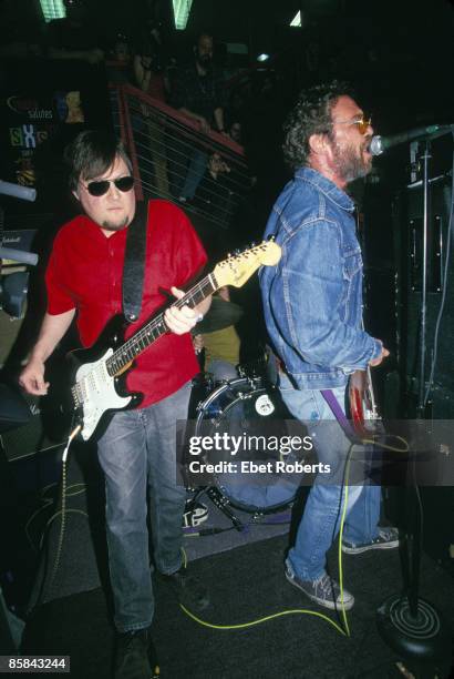 Photo of Ron ASHETON and J MASCIS & THE FOG and Mike WATT, Ron Asheton and Mike Watt performing on stage with J. Mascis and the Fog at Tower Records...