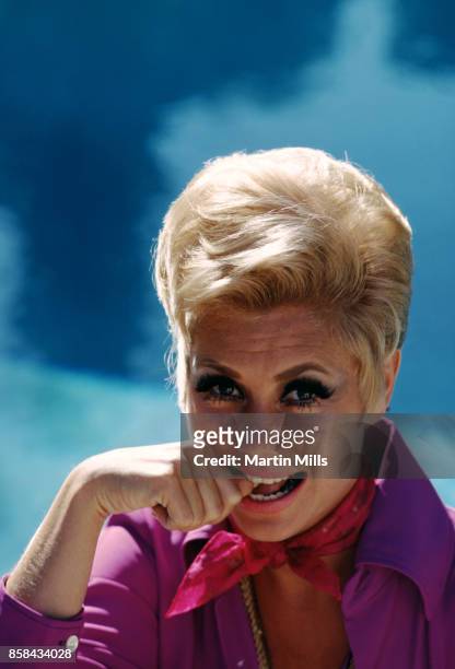 Actress, singer and dancer Mitzi Gaynor poses for a portrait in 1988 in Los Angeles, California.