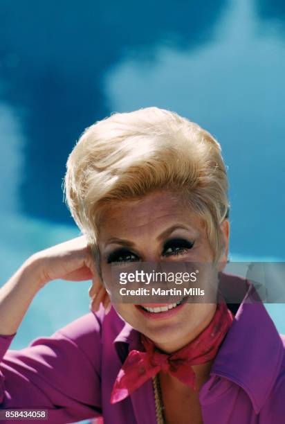 Actress, singer and dancer Mitzi Gaynor poses for a portrait in 1988 in Los Angeles, California.