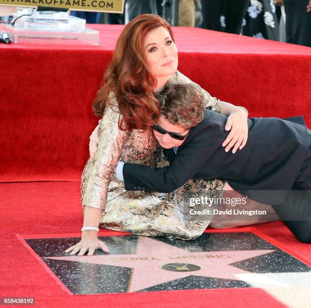 Actress Debra Messing and son Roman Walker Zelman attend her being honored with a Star on the Hollywood Walk of Fame on October 6, 2017 in Hollywood,...