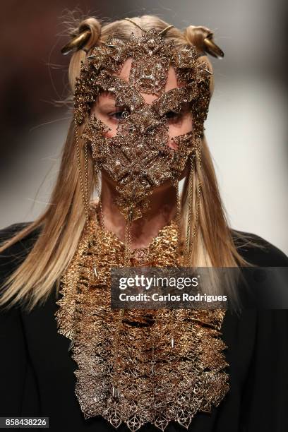 Model runs the catwalk during Valentim Quaresma Runway show on October 6, 2017 in Lisboa CDP, Portugal.