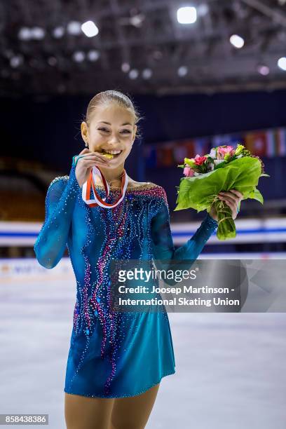Alena Kostornaia of Russia poses in the Ladies medal ceremony during day two of the ISU Junior Grand Prix of Figure Skating at Olivia Ice Rink on...