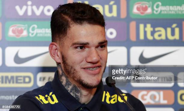 Brazil's goalkeeper Ederson speaks during a press conference after a training session at the Sao Paulo FC training center, in Sao Paulo, Brazil, on...