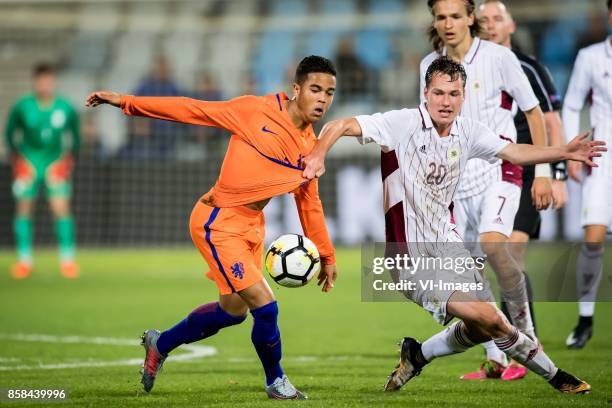 Justin Kluivert of Jong Oranje, Emsis Eduards of Jong Letland during the EURO U21 2017 qualifying match between Netherlands U21 and Latvia U21 at the...