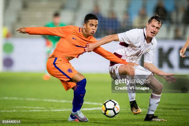 Justin Kluivert of Jong Oranje, Emsis Eduards of Jong Letland during the EURO U21 2017 qualifying match between Netherlands U21 and Latvia U21 at the...