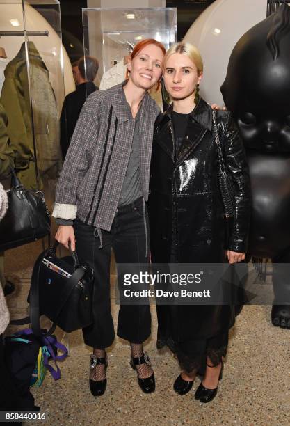Katie Shillingford and Isabella Burley attend the Dover Street Market open house on October 6, 2017 in London, England.