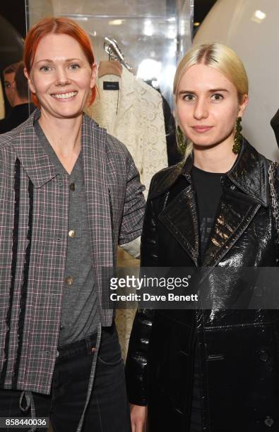 Katie Shillingford and Isabella Burley attend the Dover Street Market open house on October 6, 2017 in London, England.