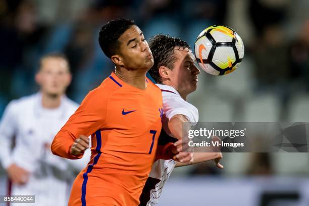 Justin Kluivert of Jong Oranje, Emsis Eduards of Jong Letland during the EURO U21 2017 qualifying match between Netherlands U21 and Latvia U21 at the...