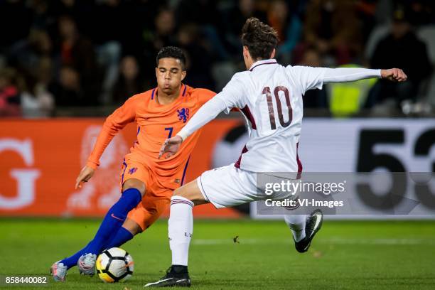 Justin Kluivert of Jong Oranje, Fjordorovs Vladislavs of Jong Letland during the EURO U21 2017 qualifying match between Netherlands U21 and Latvia...