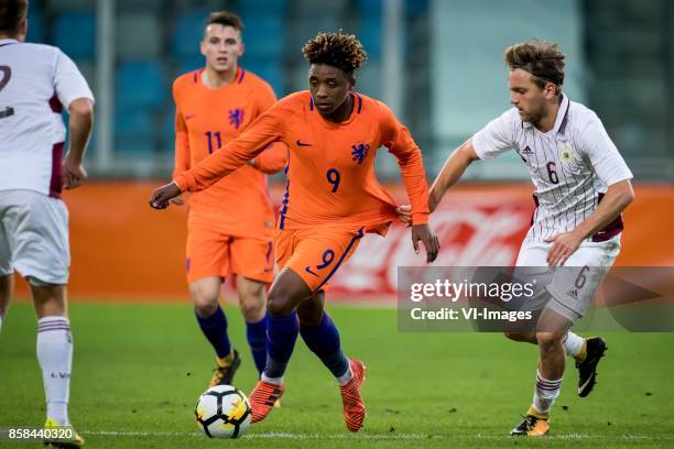 Steven Bergwijn of Jong Oranje, Karklins Kriss of Jong Letland during the EURO U21 2017 qualifying match between Netherlands U21 and Latvia U21 at...