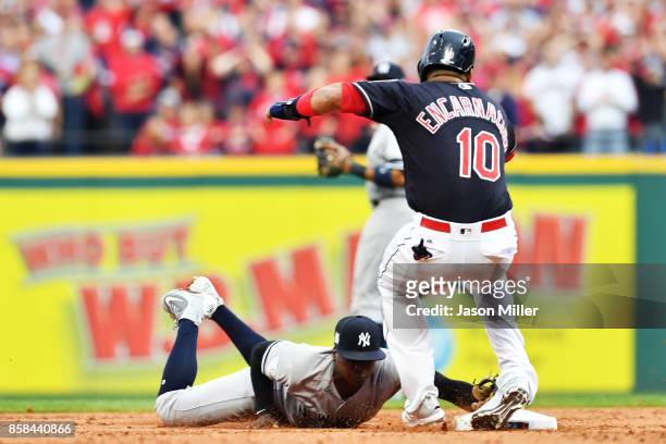 Edwin Encarnacion of the Cleveland Indians is injured in the first inning against the New York Yankees during game two of the American League...