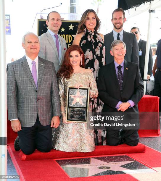 Hollywood Chamber of Commerce Chair of the Board Jeff Zarrinnam, executive producer Max Mutchnick, actresses Debra Messing and Mariska Hargitay,...