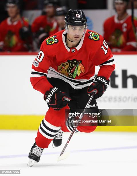 Patrick Sharp of the Chicago Blackhawks skates against the Pittsburgh Penguins during the season opening game at the United Center on October 5, 2017...