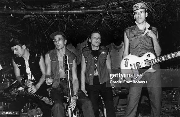 Paul SIMONON and Terry CHIMES and Joe STRUMMER and CLASH and Mick JONES; L-R: Joe Strummer, Paul Simonon, Terry Chimes, Mick Jones - posed, group shot