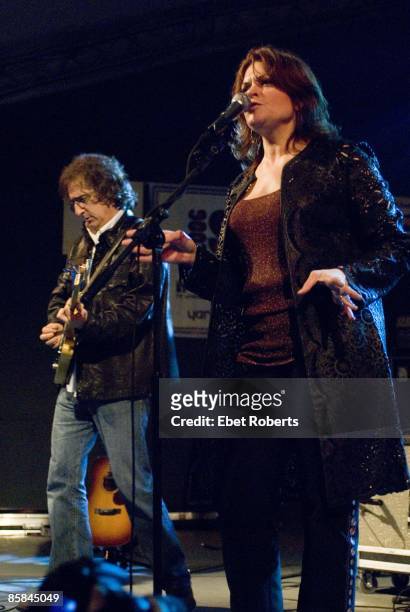 Photo of John LEVENTHAL and Rosanne CASH, L-R: John Leventhal, Rosanne Cash performing on stage