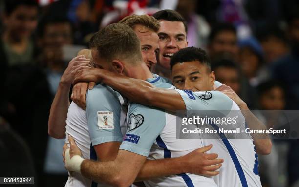 Harry Kane of England celebrates scoring his side's first goal with Jordan Henderson, Jesse Lingard and Michael Keane during the FIFA 2018 World Cup...