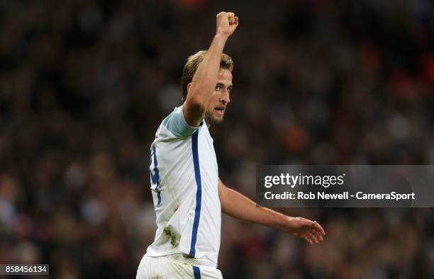 Harry Kane of England celebrates scoring his side's first goal during the FIFA 2018 World Cup Qualifier between England and Slovenia at Wembley...