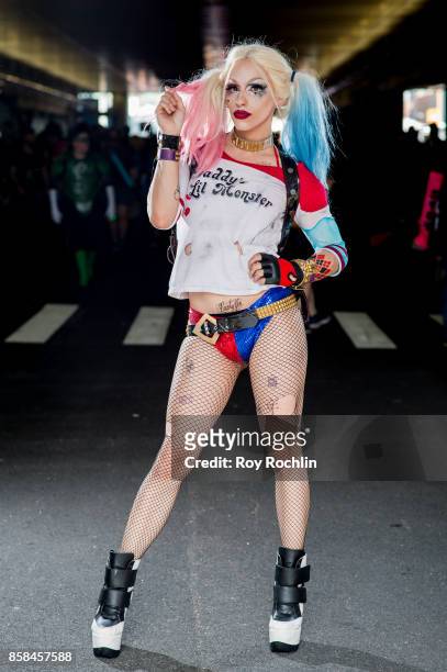 Fan cosplays as Harley Quinn from Batman, Suicide Squad and the DC universe during 2017 New York Comic Con - Day 2 on October 6, 2017 in New York...