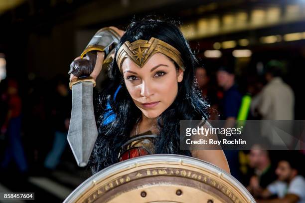 Fan cosplays as Wonder Woman from the DC universe during 2017 New York Comic Con - Day 2 on October 6, 2017 in New York City.