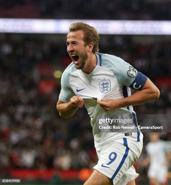 Harry Kane of England celebrates scoring his side's first goal during the FIFA 2018 World Cup Qualifier between England and Slovenia at Wembley...