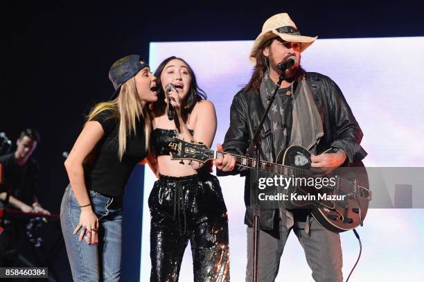 Miley Cyrus, Noah Cyrus, and Billy Ray Cyrus perform onstage during Katy Perry "Witness: The Tour" at Madison Square Garden on October 6, 2017 in New...