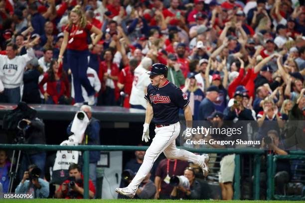 Jay Bruce of the Cleveland Indians runs the bases after hitting a solo home run in the eighth inning against the New York Yankees during game two of...