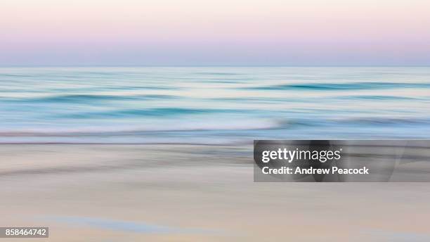 abstract patterns and color at the beach. - rippled sand stock pictures, royalty-free photos & images