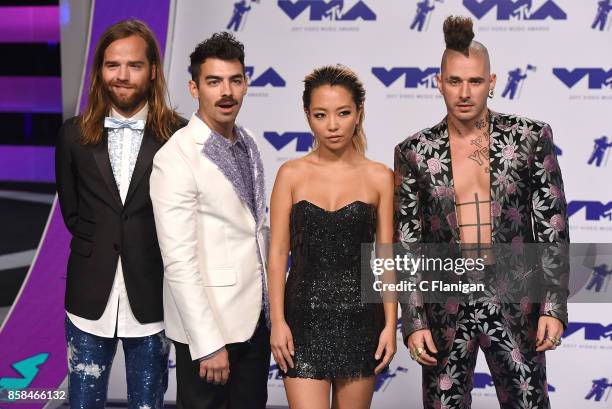 Cole Whittle, JinJoo Lee, Joe Jonas, and Jack Lawless of music group DNCE attend the 2017 MTV Video Music Awards at The Forum on August 27, 2017 in...