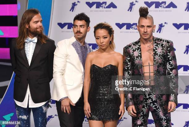 Cole Whittle, JinJoo Lee, Joe Jonas, and Jack Lawless of music group DNCE attend the 2017 MTV Video Music Awards at The Forum on August 27, 2017 in...
