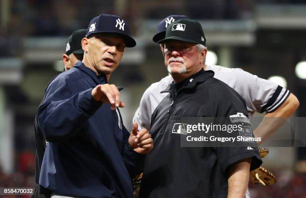 Joe Girardi of the New York Yankees argues a call in the tenth inning against the Cleveland Indians during game two of the American League Division...