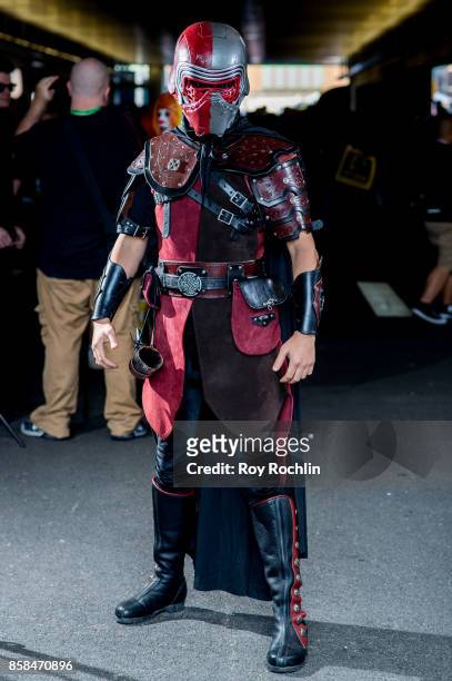 Fan cosplays as Kylo Ren from Star Wars and during 2017 New York Comic Con - Day 2 on October 6, 2017 in New York City.