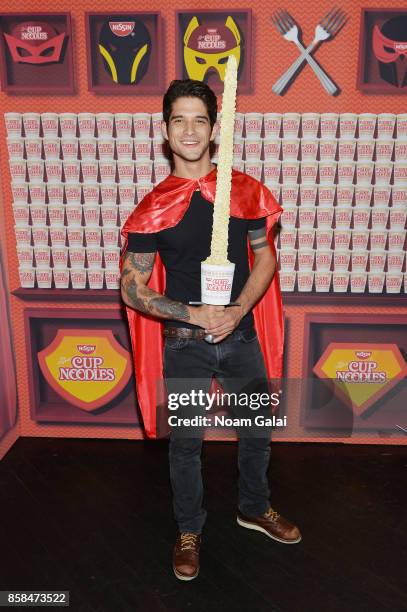 Tyler Posey poses in the Nissin Cup Noodles Lair at the annual Heroes After Dark celebration at Highline Ballroom on October 6, 2017 in New York...
