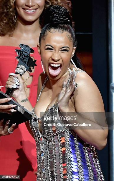 Rapper Cardi B accepts the award for 'Best New Hip Hop Artist' onstage during the BET Hip Hop Awards 2017 at The Fillmore Miami Beach at the Jackie...