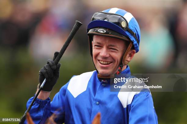 Stephen Baster smiles after riding Nomothaj to win race one the Maribyrnong Trial Stakes during Turnbull Stakes Day at Flemington Racecourse on...