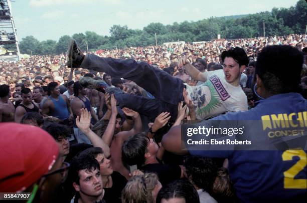 Photo of LOLLAPALOOZA, Fans crowd surfing at the Lollapalooza concert in Waterloo Village, New Jersey August 14th, 1991