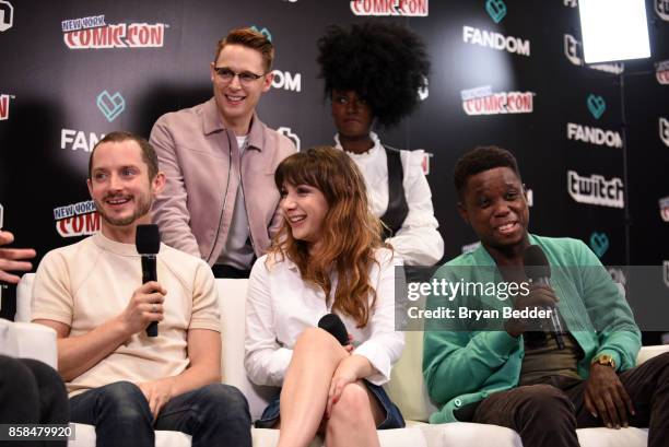 Actors Elijah Wood, Sam Barnett, Hannah Marks, Jade Eshete and Mpho Koaho speak onstage at the New York Comic Con Live Stage in partnership with...