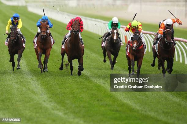 Dean Yendall rides Snitzepeg to win the Antler Luggage Stakes during Turnbull Stakes Day at Flemington Racecourse on October 7, 2017 in Melbourne,...