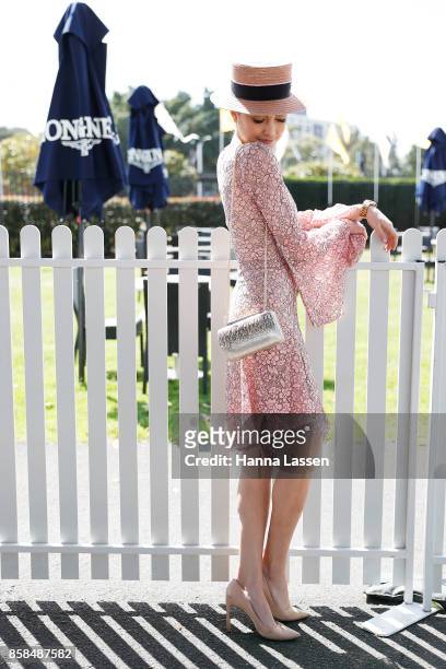 Abbey Gelmi wearing Yeojin Bae dress, Nerida Winter boater, Momco clutch and Tony Bianco shoes at Moet & Chandon Spring Champion Stakes Day at Royal...