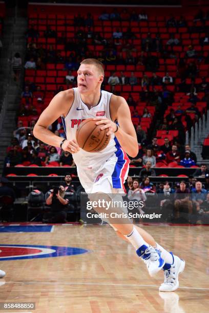 Jon Leuer of the Detroit Pistons handles the ball against the Atlanta Hawks on October 6, 2017 at Little Caesars Arena in Detroit, Michigan. NOTE TO...