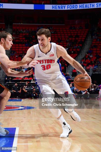 Jon Leuer of the Detroit Pistons handles the ball against the Atlanta Hawks on October 6, 2017 at Little Caesars Arena in Detroit, Michigan. NOTE TO...