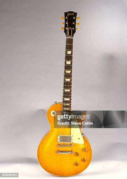 Photo of GUITAR and GIBSON GUITARS and GIBSON LES PAUL GUITAR; Standard model featuring "tiger stripe" pattern to sunburst - [208] - still life,...