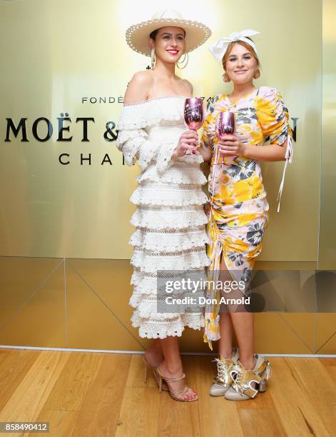 Jesinta Franklin and Carissa Walford attends Moet & Chandon Spring Champion Stakes Day at Royal Randwick Racecourse on October 7, 2017 in Sydney,...