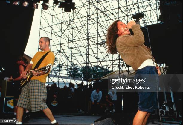 Photo of Eddie VEDDER and PEARL JAM and Stone GOSSARD, L-R: Stone Gossard and Eddie Vedder performing live onstage