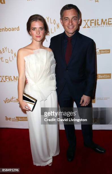 Actors Liv Lisa Fries and Volker Bruch attend the premiere of Beta Film's "Babylon Berlin" at The Theatre at Ace Hotel on October 6, 2017 in Los...
