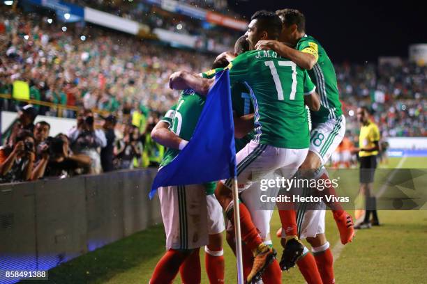 Javier Hernandez of Mexico celebrates with teammates after scoring the second goal of his team during the match between Mexico and Trinidad & Tobago...