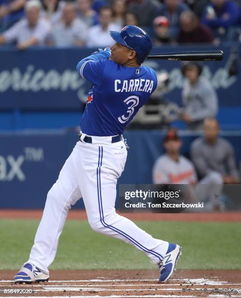 Ezequiel Carrera of the Toronto Blue Jays bats in the first inning during MLB game action against the Baltimore Orioles at Rogers Centre on September...