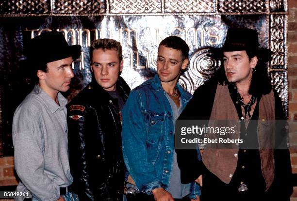 Photo of U2; L-R: The Edge, Larry Mullen Jnr, Adam Clayton, Bono - posed, group shot, Joshua Tree press conference